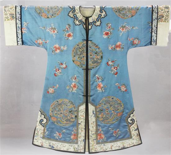 A Chinese blue satin womans robe, constructed c.1920 length 120cm, removable perspex case